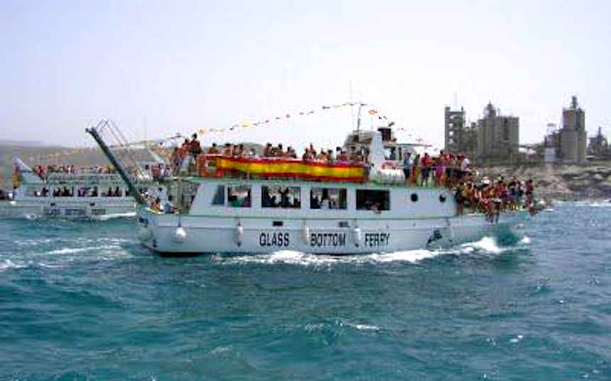 Salmon lines glass bottom ferry leaving Aguineguin