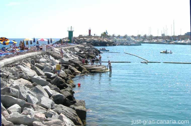Steps and a concrete swimming platform on the breakwater